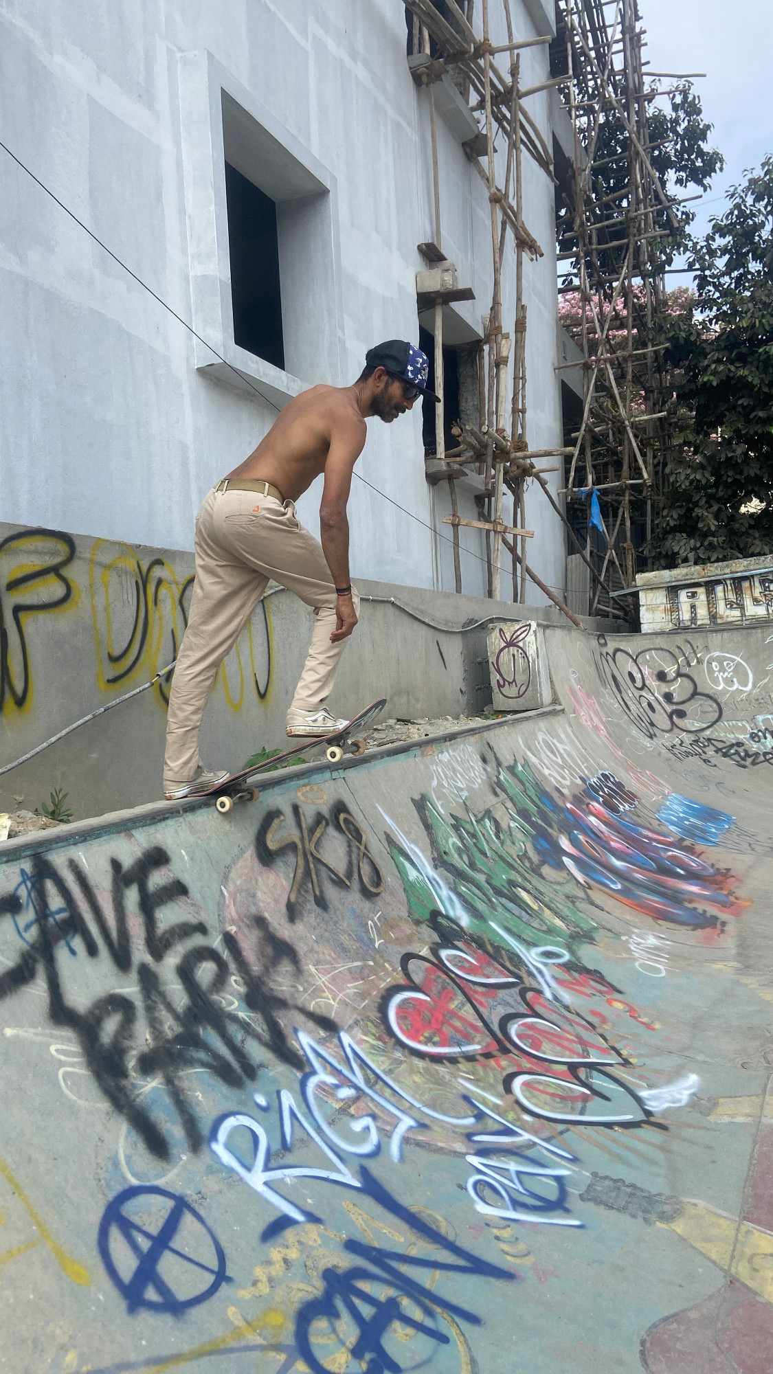 Soms dropping into a skate bowl
